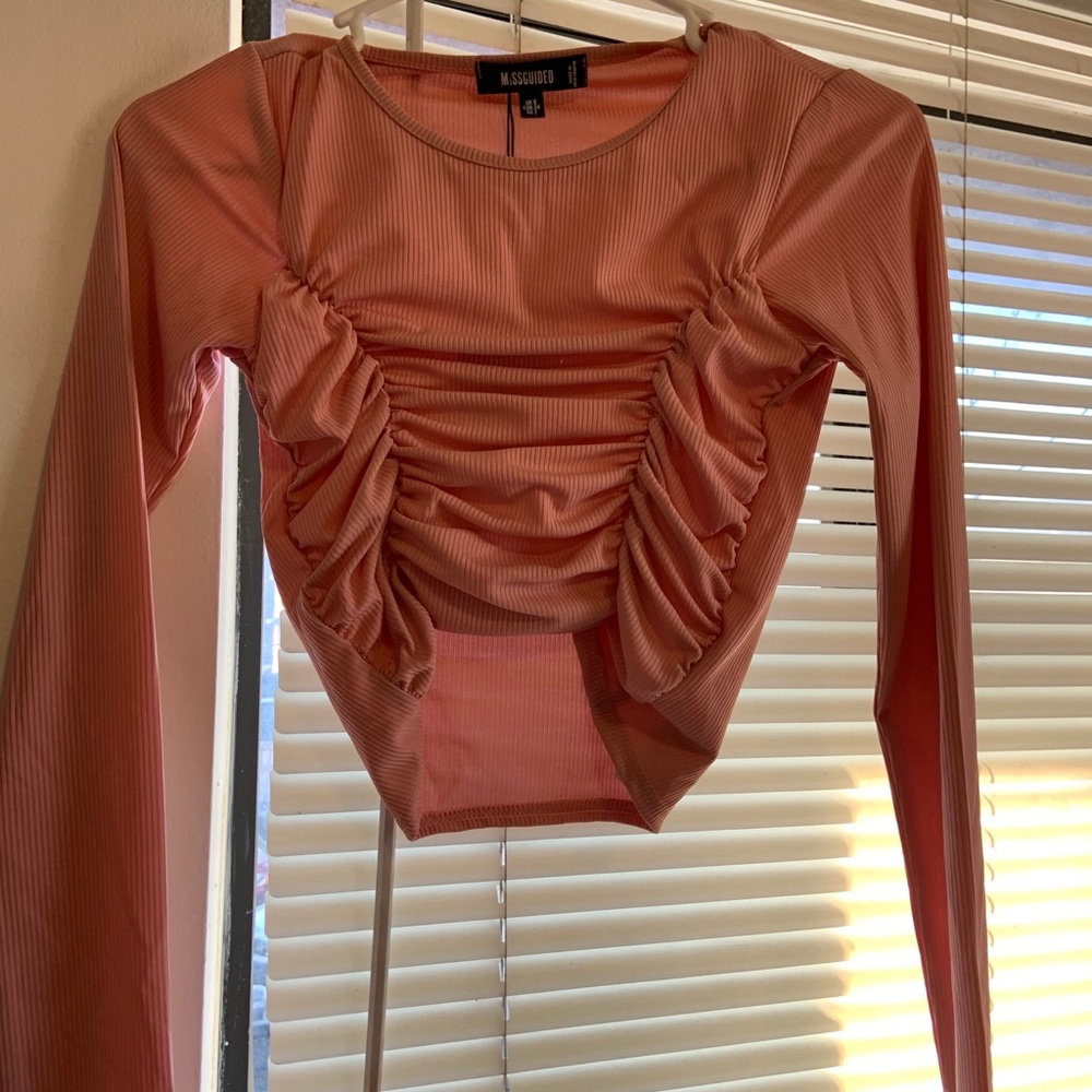 pink ruffled long sleeve crop top